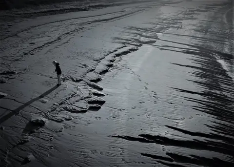 Andrew Aughton Child on a beach