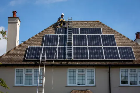 Getty Images solar panels on a house