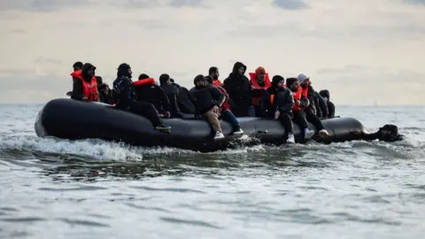 Getty Migrants crossing the channel