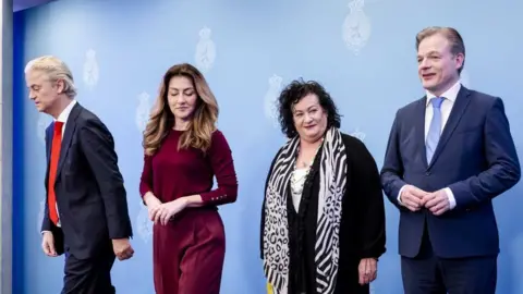  KOEN VAN WEEL/EPA Dutch party leaders Geert Wilders (PVV), Dilan Yesilgoz (VVD), Caroline van der Plas (BBB) and Pieter Omtzigt (NSC) react after posing for a group photograph during the presentation of the main lines agreement for a new cabinet, in the Hague, the Netherlands, 16 May 2024