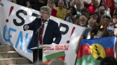 Jeremy Suyker/Bloomberg  Jean-Luc Melenchon, leader of the France Unbowed party, speaks during an campaign rally in Montpellier