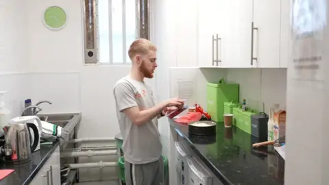 Morgan places the finishing touches to his cheesecake