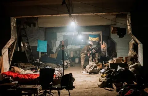 Dmytro Kozatsky Interior of a dark bunker in Mariupol