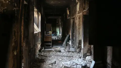 Getty Images A picture shows the destruction in the dialysis unit at Gaza's devastated Al-Shifa hospital