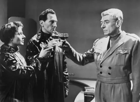 Getty Images Yvonne Mitchell, Peter Cushing and Andre Morrell in the 1954 BBC production of 1984