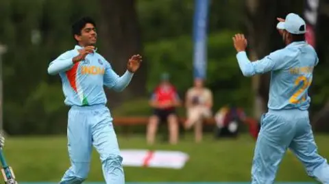 Getty Images Saurabh Netravalkar of India celebrates his dismissal of Chris Dent of England (L) during the ICC U19 Cricket World Cup match between India and England at the Bert Sutcliffe Oval on January 21, 2010 in Lincoln, New Zealand