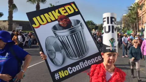 Getty Images A supporter protesting ahead of the motion of no confidence vote against President Jacob Zuma on August 08, 2017