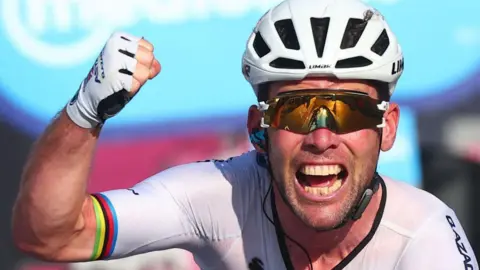 Getty Images Mark Cavendish celebrates a cycling victory