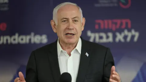 Reuters Israeli Prime Minister Benjamin Netanyahu speaks at the Sheba Medical Center in Ramat Gan, Israel (8 June 2024)