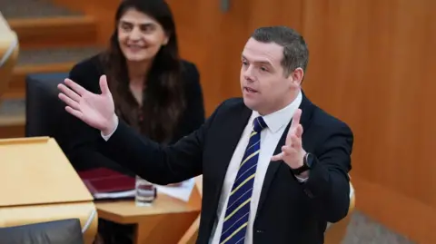 PA Media Douglas Ross, leader of the Scottish Conservatives, in Holyrood