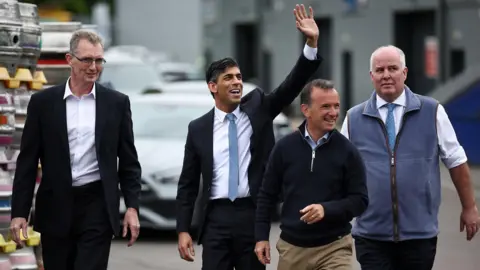 Reuters David TC Davies with Rishi Sunak, Alan Cairns and Andrew RT Davies