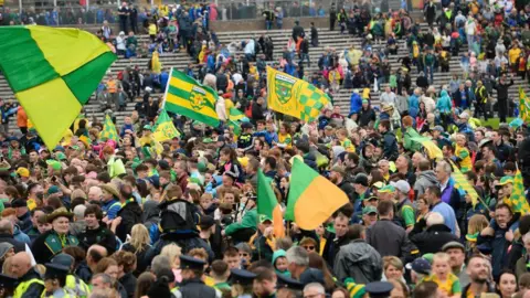 Getty Fans on the pitch at St Tiernach’s Park