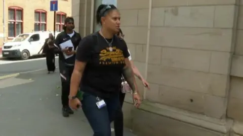 Nadine Beckford, Jaydon's aunt, walking into the coroner's court