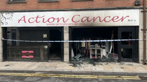 BBC A fire damaged Action Cancer store in Bangor