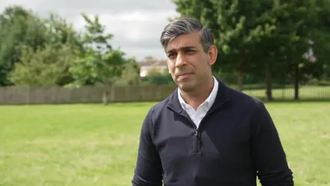 BBC Rishi Sunak speaking to reporters