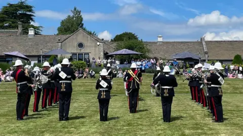 Dorothy House The Royal Marines Band Collingwood performing on the front Lawn of Dorothy House in Winsley near Bradford-on-Avon.