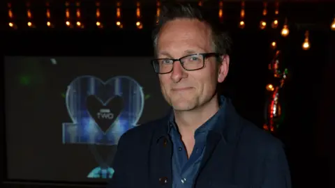 BBC Michael Mosley smiling at camera.