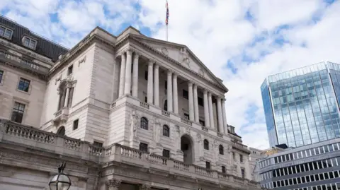 Getty Images Bank of England on a cloudy summer's day with City buildings in the background