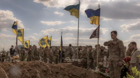 AFP via Getty Images Azov brigade members attend a funeral ceremony of a fallen comrade in Vinnytsia, south-western Ukraine. Photo: May 2024