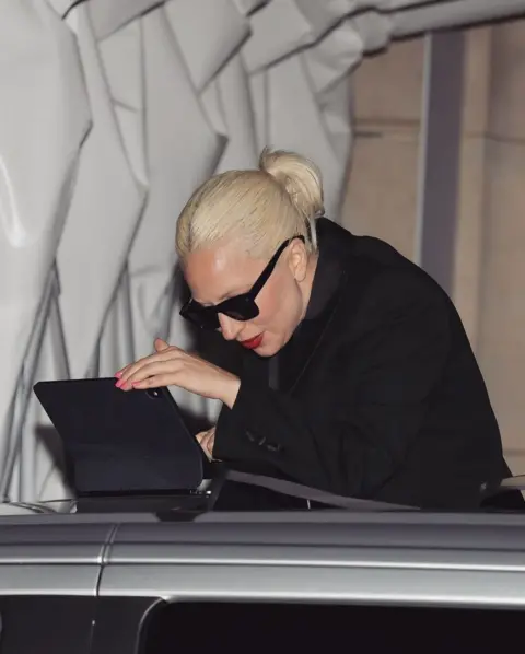 ladygagarazzii  / Instagram Lady Gaga tinkers with her laptop as she plays new music to fans