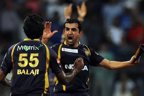 AFP Kolkata Knight Riders cricketer Gautam Gambhir celebrates with teammate Laxmipathy Balaji after winning the IPL Twenty20 cricket match between Mumbai Indians and Kolkata Knight Riders at The Wankhede Stadium in Mumbai on May 16,