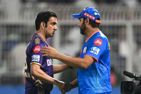 AFP Mumbai Indians' Rohit Sharma (R) greets Kolkata Knight Riders' mentor Gautam Gambhir at the end of the Indian Premier League (IPL) Twenty20 cricket match between Kolkata Knight Riders and Mumbai Indians at the Eden Gardens in Kolkata on May 11, 2024.