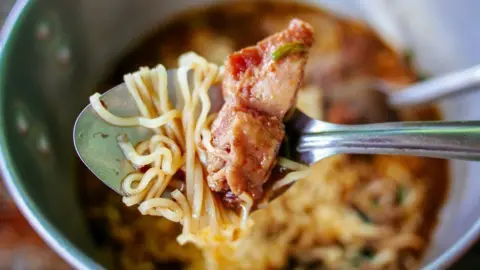 Getty Images Noodles on a spoon