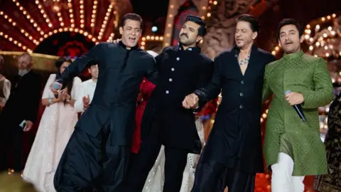 Reuters Actors Salman Khan, Ram Charan, Shah Rukh Khan and Aamir Khan perform during the pre-wedding celebrations of Anant Ambani, son of Mukesh Ambani, the Chairman of Reliance Industries, and Radhika Merchant, daughter of industrialist Viren Merchant, in Jamnagar, Gujarat, India, March 2, 2024