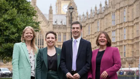 PA Media The four new Green MPs from left to right: Sian Berry (MP for Brighton Pavilion), party co-leader Carla Denyer (MP for Bristol Central), party co-leader Adrian Ramsay (MP for Waveney Valley) and Ellie Chowns (MP for North Herefordshire)