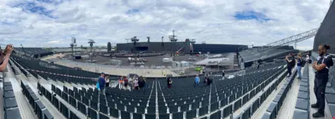 Getty Images A wide shot of Adele's concert venue in Munich, showing the scale of the stage and a panoramic view of the seating