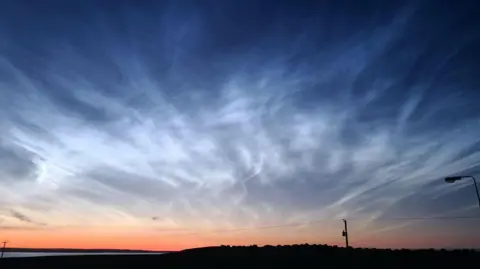 Carlt/BBC Weather Watchers Noctilucent clouds photographed from Stornoway