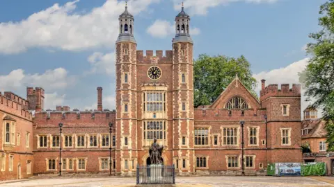 Getty Images The main courtyard on the campus of Eton College red brick facade with cream inlays to windows and a statue centre