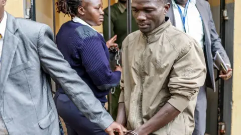 AFP Collins Jumaisi Khalusha is escorted to the Kiambu law courts - 16 July 2024