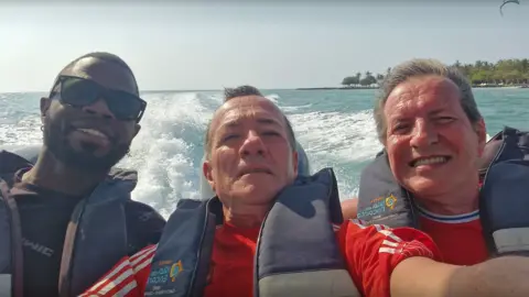  Albert Alfonso/Flickr Yostin Mosquera, 34, Paul Longworth, 71 and Albert Alfonso, 62, on a boat in Colombia