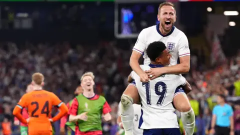 PA Media Harry Kane and Ollie Watkins celebrating after their semi-final win over the Netherlands