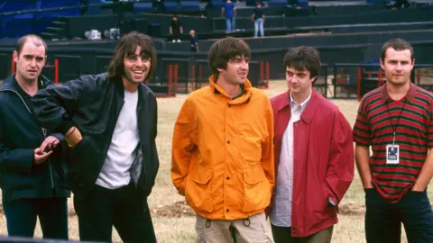 Getty Images L-R Paul 'Bonehead' Arthurs, Liam Gallagher, Noel Gallagher, Paul 'Guigsy' McGuigan and Alan White