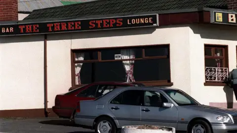 Pacemaker Archive image showing a small pub painted white with The Three Steps name in red letters at the top.