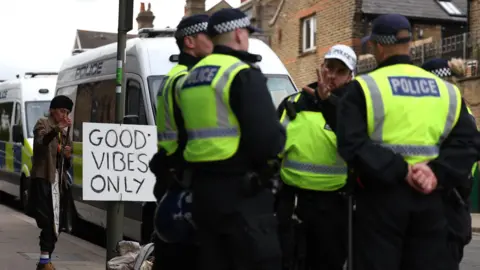 EPA Police officers in North Finchley as further far-right protests are expected in the area and throughout the country