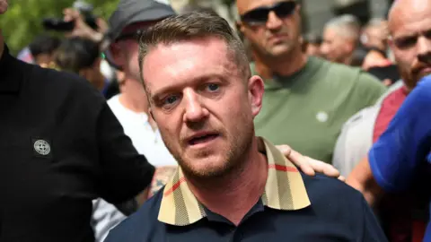 Reuters Stephen Yaxley-Lennon aka Tommy Robinson, wearing a polo shirt with a Burberry check on the collar, at a protest on his behalf last week