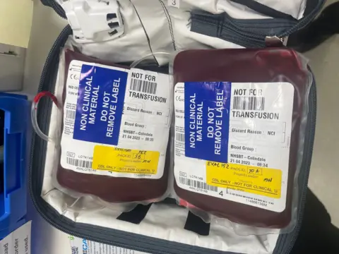 Apian Ltd/PA Wire An image of a unzipped bag showing two packs of blood with a sign on them saying non clinical material not for transfusion 