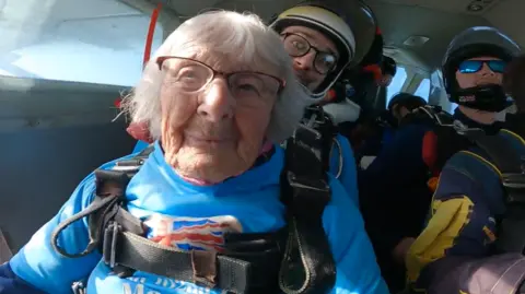 UK Parachuting Services Ltd/Goldster Man pictured in the plane prior to her jump