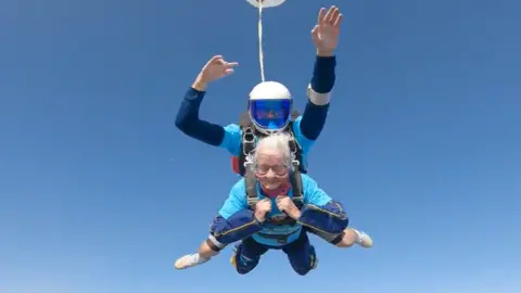 UK Parachuting Services Ltd/Goldster Mrs Baillie during her skydive