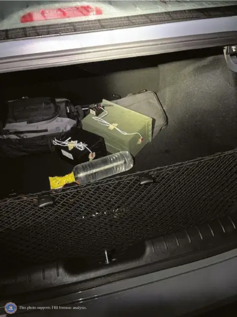 FBI Wires and boxes in the boot of a car