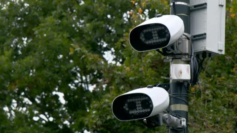 BBC/TOMOS TV Two Automatic Number Plate Recognition cameras on a pole.