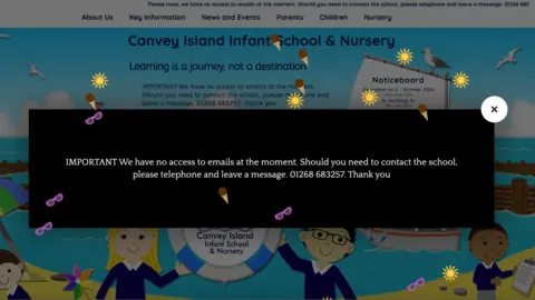 A screenshot from Canvey Island Junior School's website asking visitors not to send emails because of a cyber attack