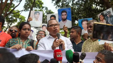 EPA United People's Democratic Front (UPDF) leader Michael Chakma, who was released from the secret detention center locally know as 'Aynaghor' after five years, speaks during an event organized to mark International Day of the Victims of Enforced Disappearances, at central Shaheed Minar in Dhaka