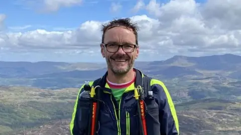 LinkedIn Stephen Chamberlain during a running event.