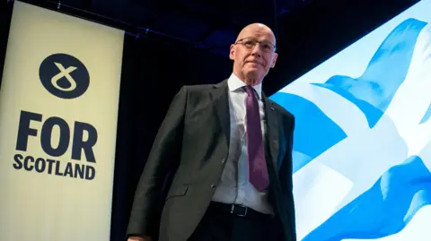 PA Media First Minister John Swinney at the SNP Annual National Conference at the Edinburgh International Conference Centre.