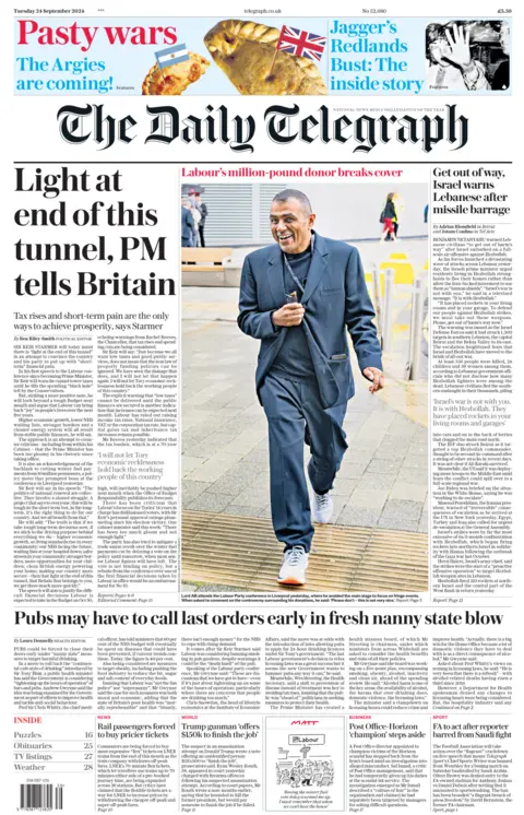 The front page of the Telegraph. The headline reads: 'Light at the end of this tunnel, PM tells Britain.'