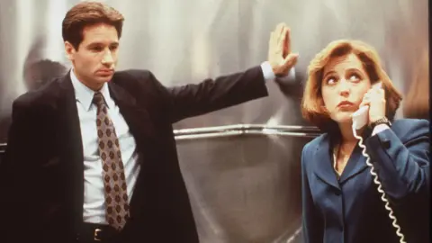 Getty Images Gillian Anderson and David Duchovny on The X Files in 1996